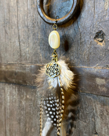 Echte veren oorhanger 10