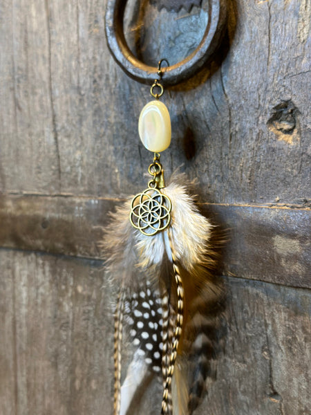 Echte veren oorhanger 10